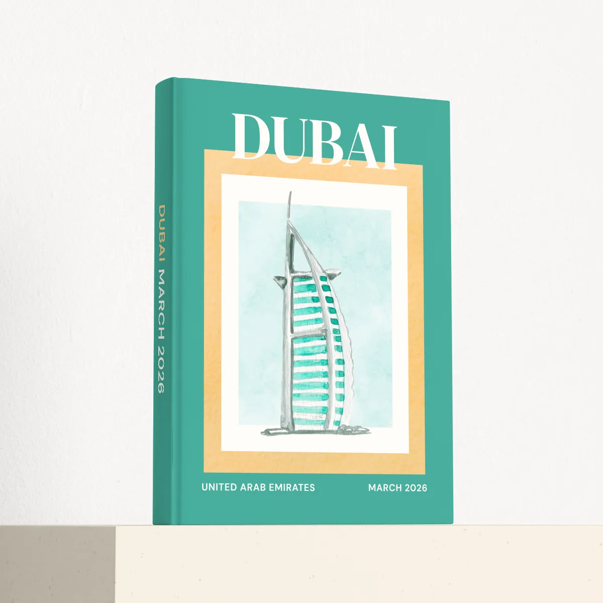Dubai travel photobook standing at an angle, showing the printed spine and matte hardcover