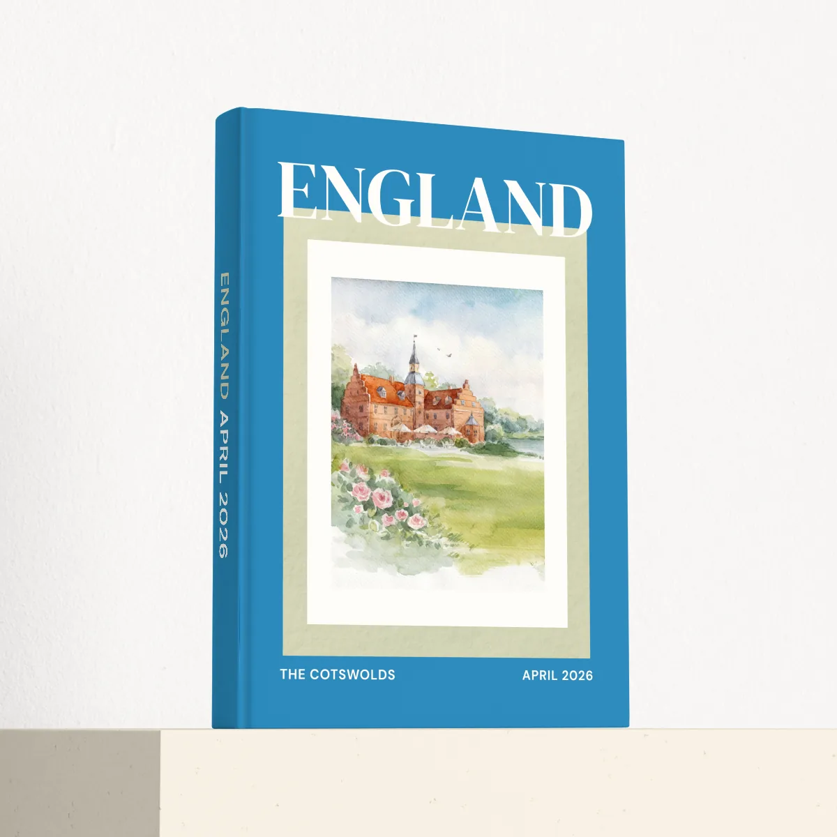 England travel photobook standing at an angle, showing the printed spine and matte hardcover