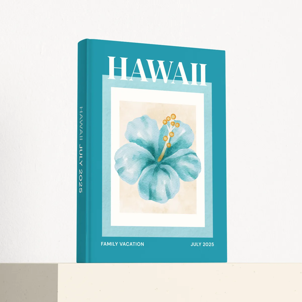 Hawaii travel photobook standing at an angle, showing the printed spine and matte hardcover