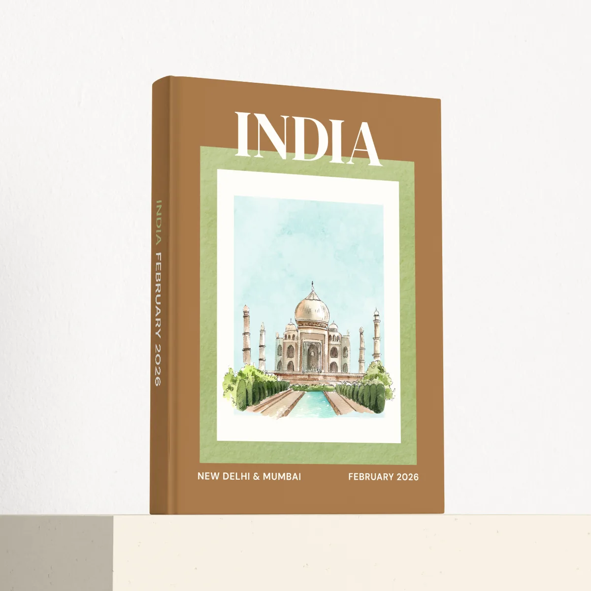 India travel photobook standing at an angle, showing the printed spine and matte hardcover