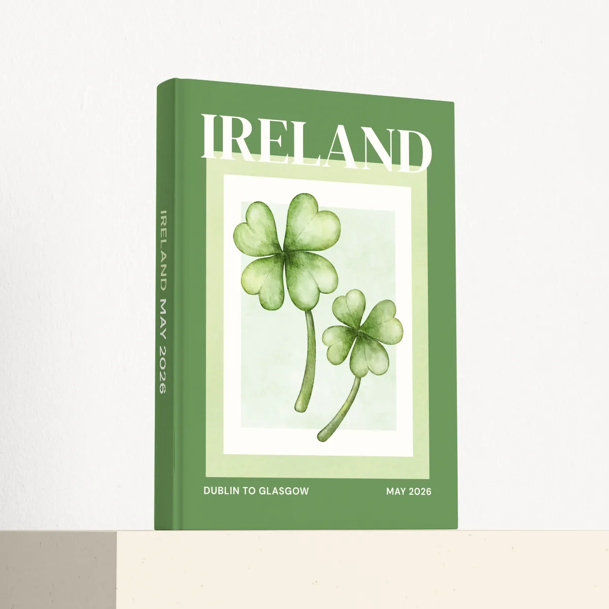 Ireland travel photobook standing at an angle, showing the printed spine and matte hardcover