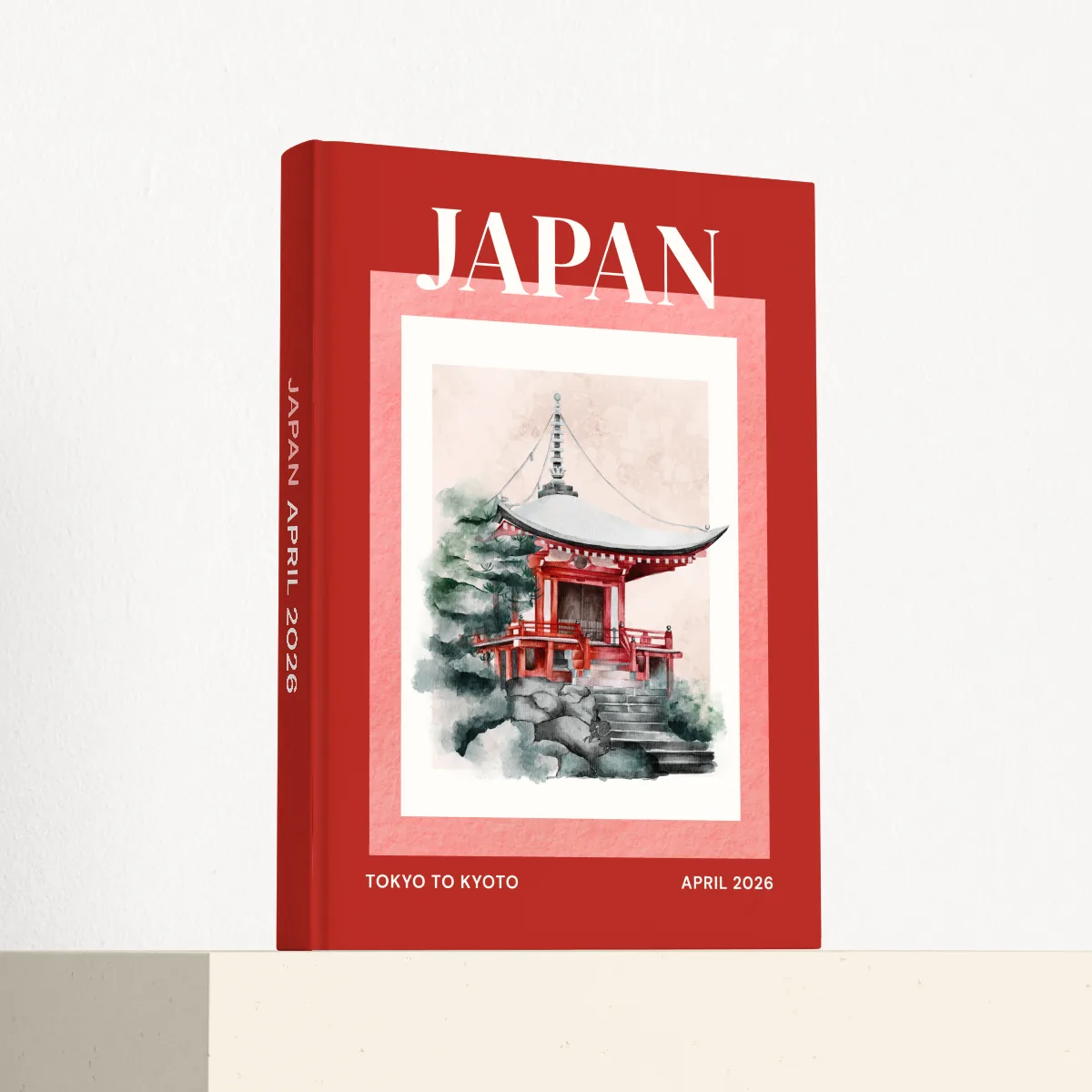 Japan travel photobook standing at an angle, showing the printed spine and matte hardcover