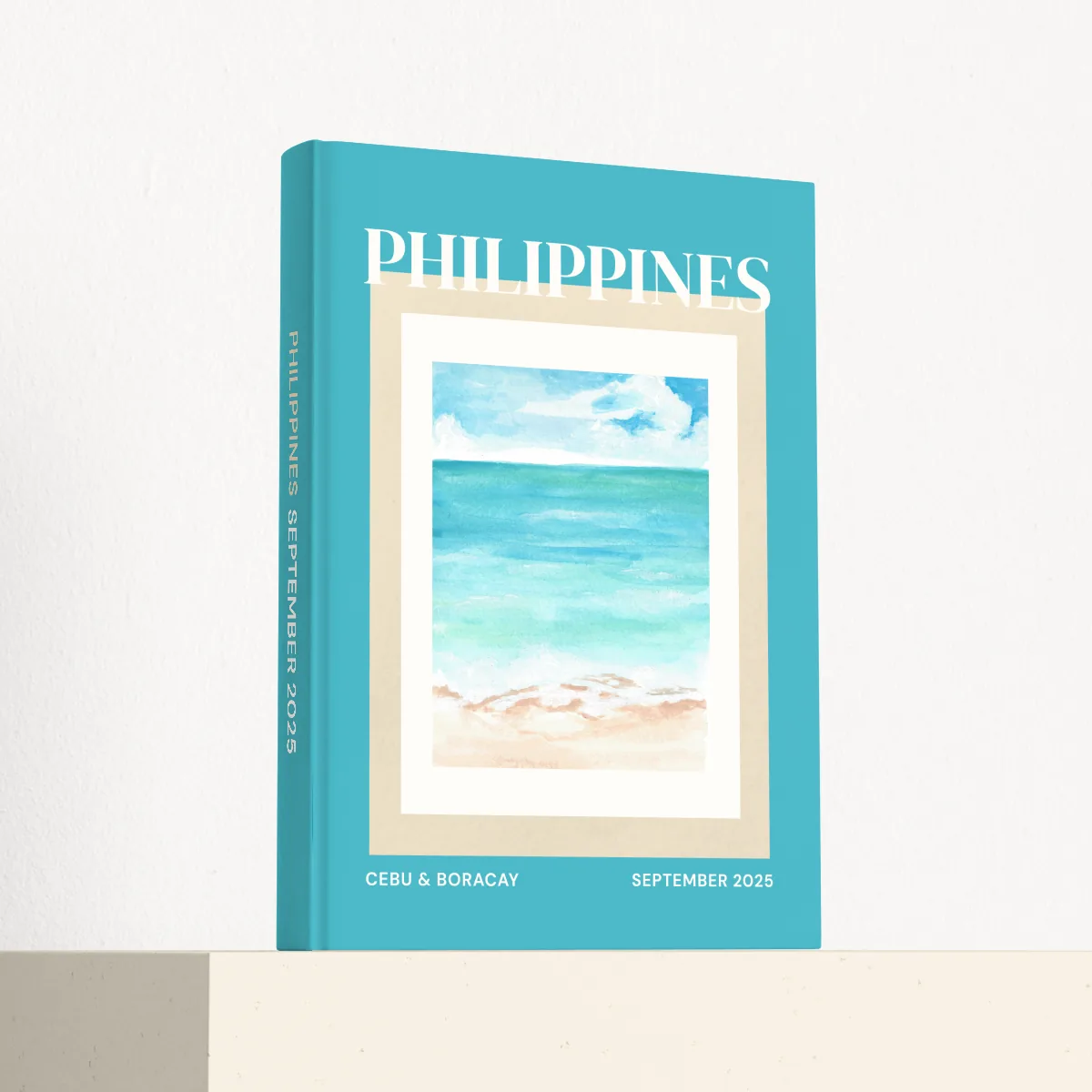 Philippines travel photobook standing at an angle, showing the printed spine and matte hardcover