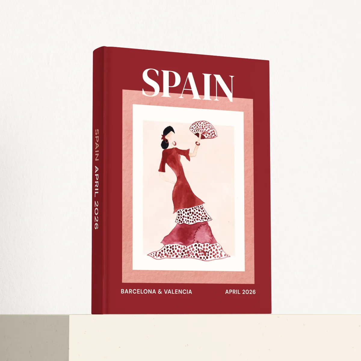 Spain travel photobook standing at an angle, showing the printed spine and matte hardcover